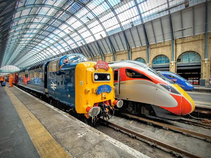 Deltic D9009 stood alongside an LNER Azuma having just arrived at King's Cross.