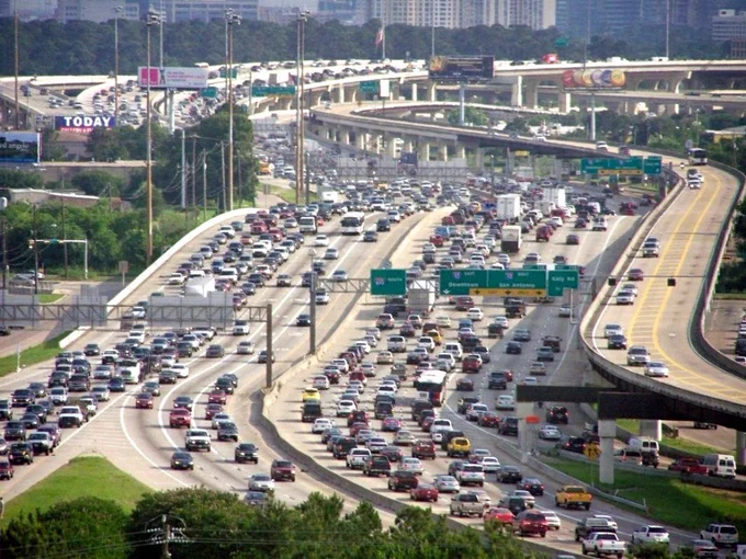 Dozens of lanes on highway, still congested.