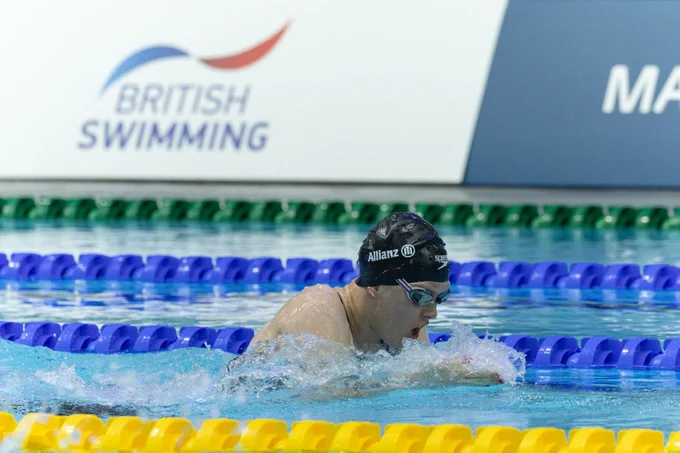 Brock Whiston swims during the SB9 Women's 100m Breaststroke heats at the Manchester 2023 Allianz Para Swimming World Championships.