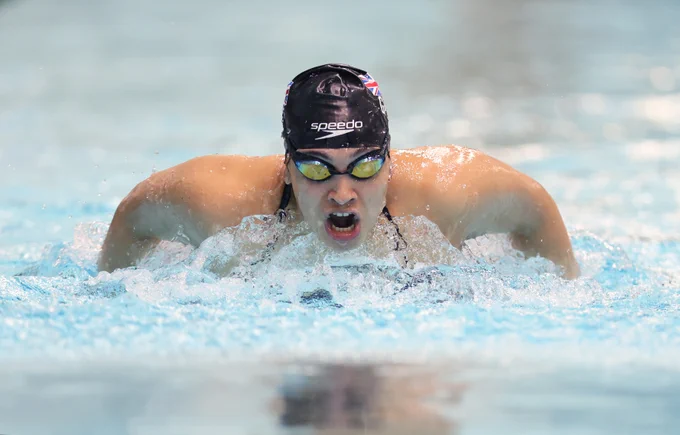 Grace Harvey swims butterfly during a The National Lottery X 2023 World Aquatics Championships event at Manchester Aquatics Centre.
