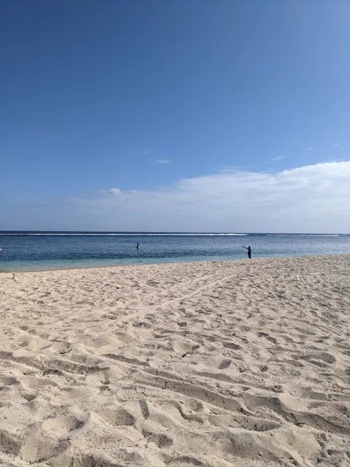 Blue sky, blue sea, white sand