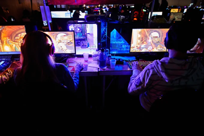 Two friends in the BYOC gaming together