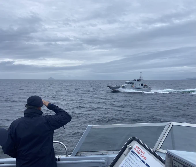 SMITER saluting CHARGER at sea