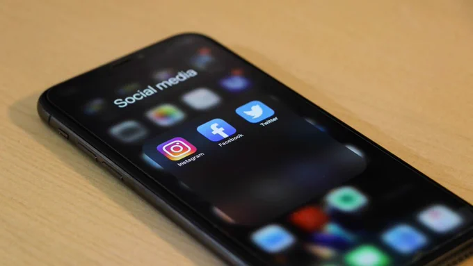 Social media icons on a phone