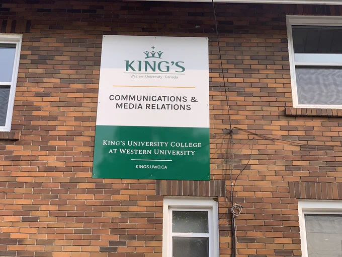 King's Communications and Media Relations sign on the side of King's House