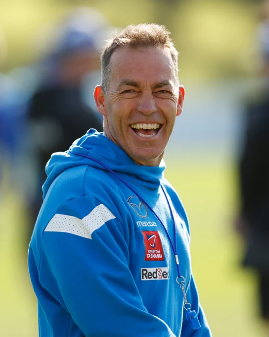 Alastair Clarkson smiles at North Melbourne training.