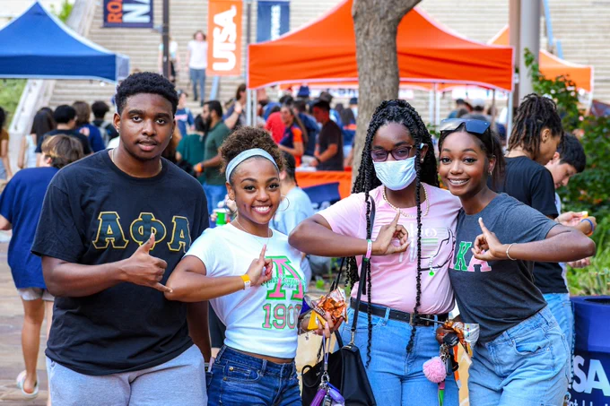 Students smile at the camera during Kickback at the Union.