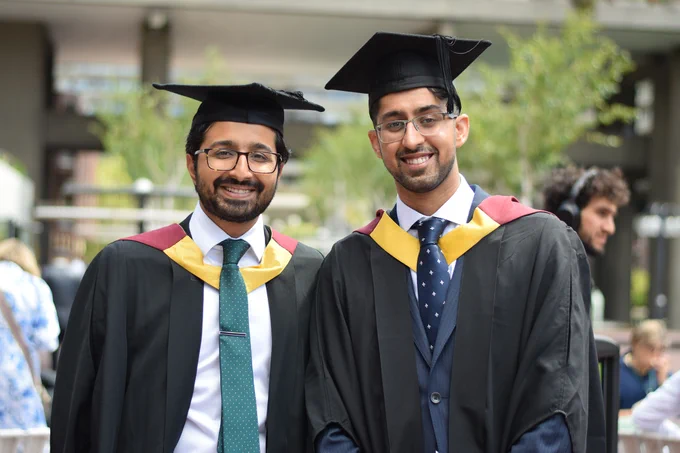 Alumni celebrating at graduation