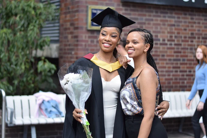 Alumni celebrating at graduation