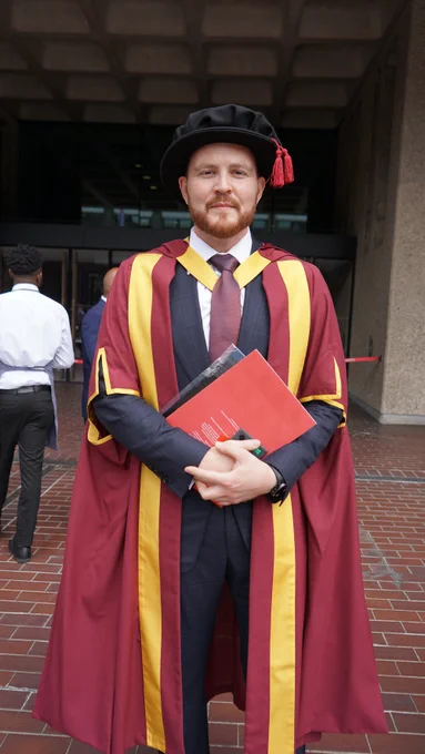 Alumnus celebrating at graduation