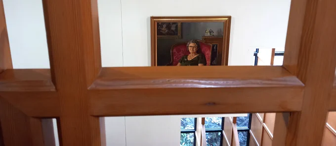 An oil painting of Mabel Robinson hangs in the library, it was painted by Sam Morse-Brown 