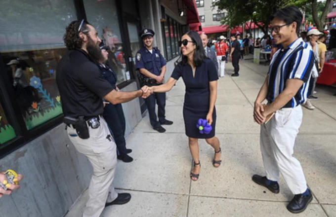 Mayor Wu greeting police officers