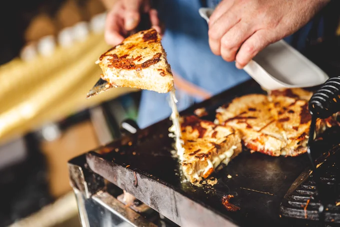 Close up of a toastie on a grill 