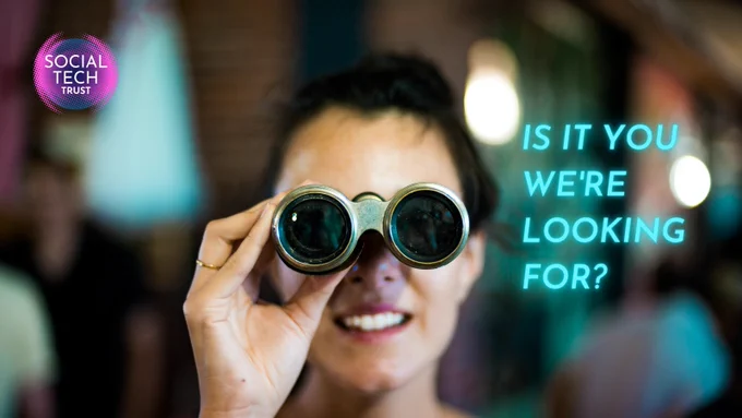 Woman holding binoculars to her face. Caption reads: is it you we're looking for?