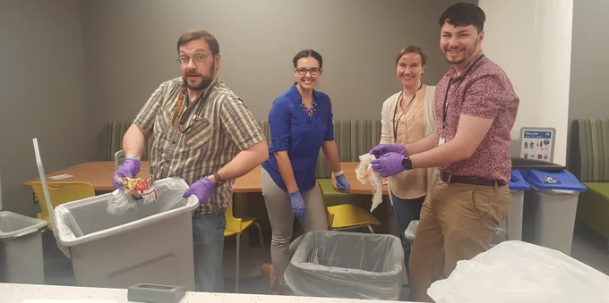 MCPA staff sorting waste in bins