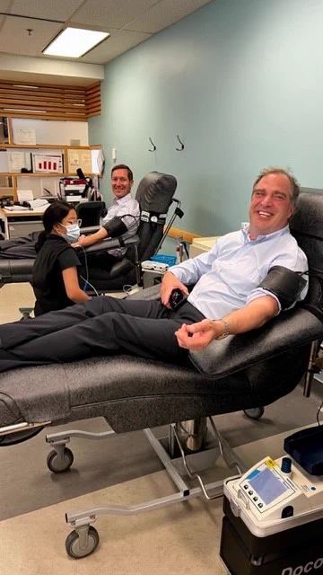 Leith Wheeler Investment Counsel staff (left to right) Daren Atkinson and James Dungate donated blood at the Canadian Blood Services’ downtown clinic.