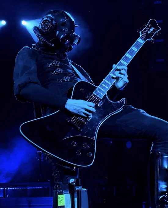 phantom ghoul playing guitar, dark blue lighting