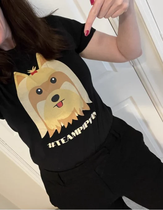 Kate looking very excited to see the Meg, wearing a T-shirt showing a Yorkshire Terrier and the slogan Team Pippin.