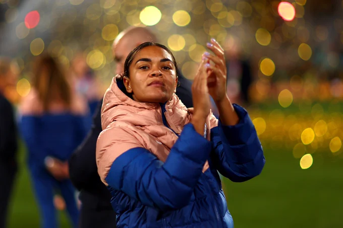 Jess Carter applauds the England fans after the game.