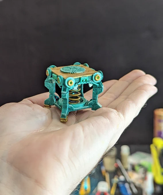 A miniature SPRING from Tears of the Kingdom made from off-brand LEGO, a soap pump spring, beads, and other random junk