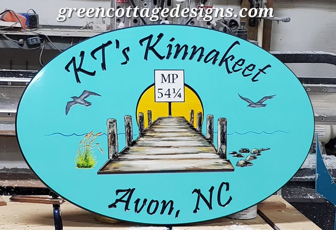 About this sign:
36: wide x 24" tall
Created with solid one inch thick PVC!
Engraved lettering and details!
Hand painted dock, sea grass, mile post seagulls & rocks!

A gloss finish!

Computer previews are provided for customer approval, before any work is done!

Shop online at our Etsy store called green cottage design!