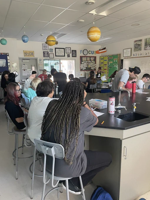 Middle school students in a science laboratory at school.