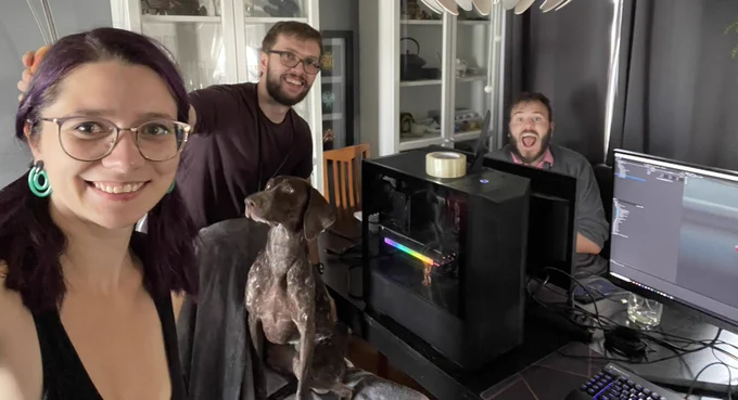 Me, my husband and Dustin setting up in our dining room, with my dog Kida in the middle