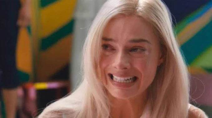 Image of Margot from Barbie movie crying