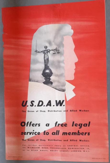 "USDAW offers a free legal service to all members. The Union of Shop Distributive and Allied Workers". A2 poster. Union of Shop Distributive and Allied Workers. Pale red background, photo of the gold statuye of justice on a a silhouette of a judge.