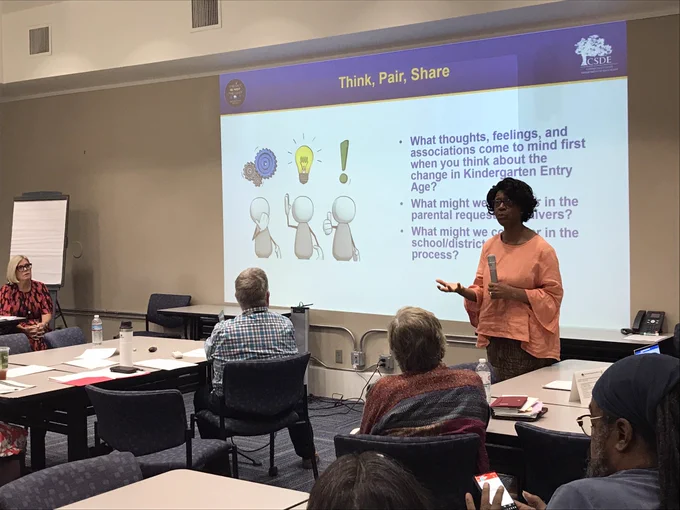 Charlene with slide “Think, Pair, Share”