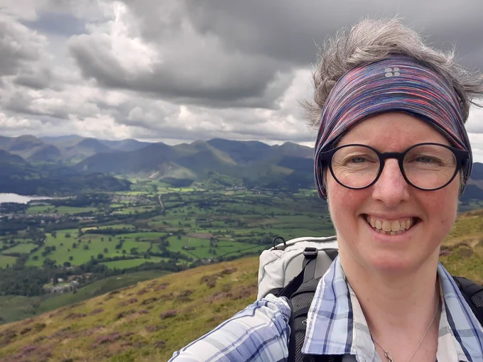 Selfie on the way up Skiddaw with the Western Fells behind