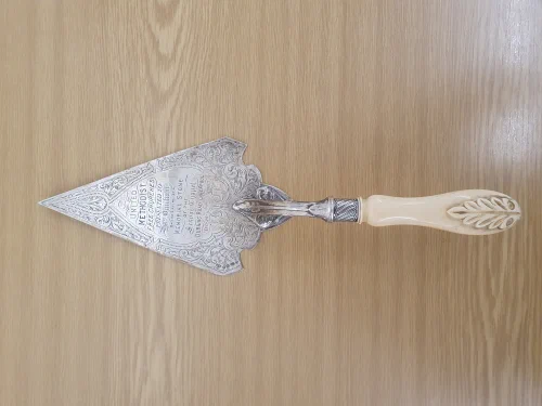 Photograph of a ceremonial silver trowel presented to Mrs Quilliam, the mother of Abdullah Quilliam Add MS 89684/4/6