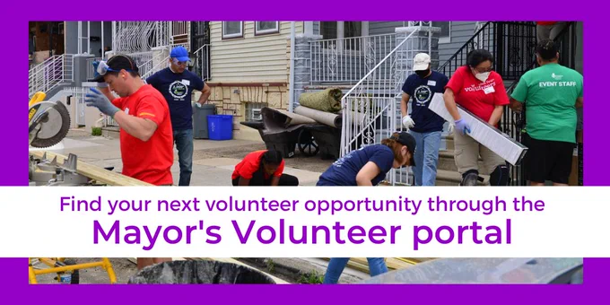 Graphic with a purple frame and photo in the middle. The photo is of 4 volunteers moving around the front of a house; one is carrying materials and another is sawing at a length of wood. Beneath the photo, text reads, "Find your next volunteer opportunity through the Mayor's Volunteer portal."