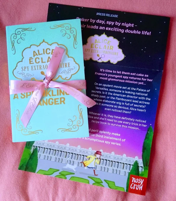 Proof copy of Alice Éclair Spy Extraordinaire A Sprinkling of Danger by Sarah Todd Taylor wrapped in a pink ribbon next to the press release 