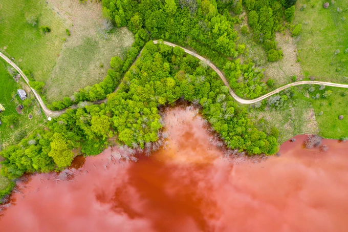 Aerial view of red copper mining waste