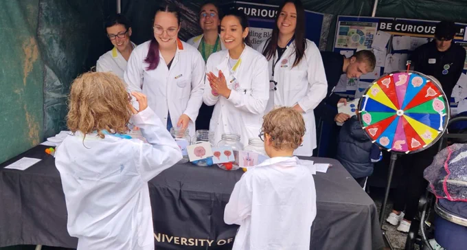 University of Leeds researchers teaching children how to keep themselves healthy at stall.