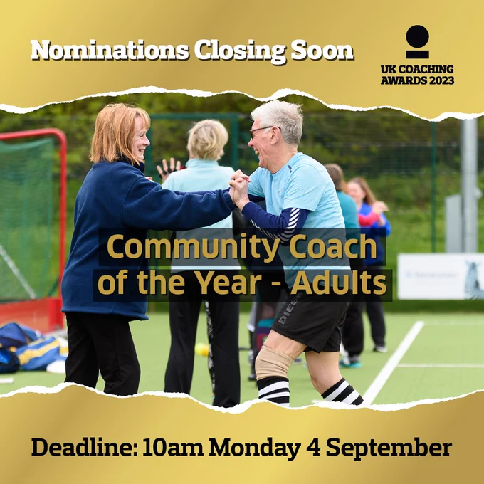 Smiling coach and laughing participant embrace on the hockey field. Words overlaid "Nominations Open" "Community Coach of the Year - Adults"
