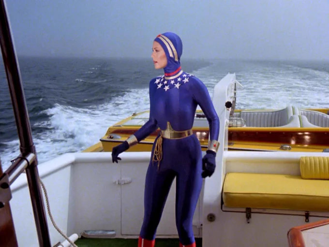 Lynda Carter in a blue wetsuit on a boat