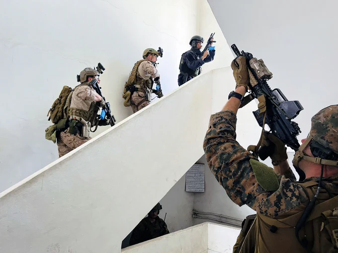 U.S. Reconnaissance Marines with 3rd Force Reconnaissance Company, 4th Marine Division, conduct Close Quarters Tactics (CQT) with Tunisian Regiment Commandos Marine (RCM) as part of African Lion 23 in Bizerte, Tunisia on May 25, 2023. CQT consist of training in a close quarters environment with explosive and ballistic breaching tactics, techniques, and procedures. African Lion is part of an ongoing military cooperation between the United States and Tunisia, which aims to enhance security in Tunisia. Eighteen nations and approximately 8,000 personnel will participate in African Lion 2023, U.S. Africa Command’s largest annual combined, joint exercise that will take place in multiple countries to include Tunisia from May 13 – June 18, 2023. (U.S. Marine Corps photo by Major Lara Soto)