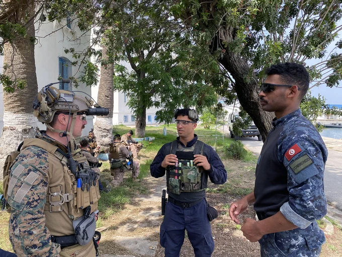 U.S. Reconnaissance Marines with 3rd Force Reconnaissance Company, 4th Marine Division, conduct Close Quarters Tactics (CQT) with Tunisian Regiment Commandos Marine (RCM) as part of African Lion 23 in Bizerte, Tunisia on May 25, 2023. CQT consist of training in a close quarters environment with explosive and ballistic breaching tactics, techniques, and procedures. African Lion is part of an ongoing military cooperation between the United States and Tunisia, which aims to enhance security in Tunisia. Eighteen nations and approximately 8,000 personnel will participate in African Lion 2023, U.S. Africa Command’s largest annual combined, joint exercise that will take place in multiple countries to include Tunisia from May 13 – June 18, 2023. (U.S. Marine Corps photo by Major Lara Soto)