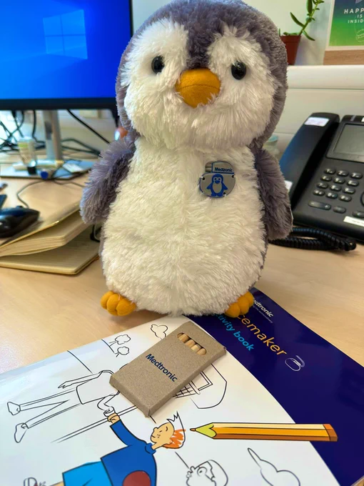 Toy penguin with an imitation pacemaker fitted to its chest