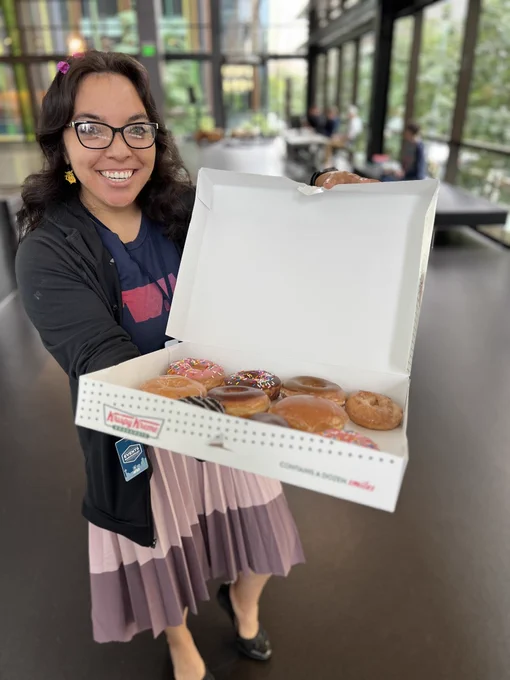 Lizzie from Twilio showing off donuts
