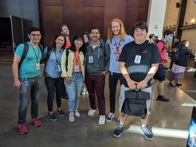 Andre and a group of attendees at the conference