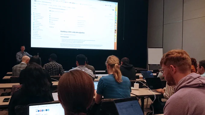 Argonne's Taylor Childers leads a breakout session on deep learning at the 2023 Argonne Training Program on Extreme-Scale Computing. 
