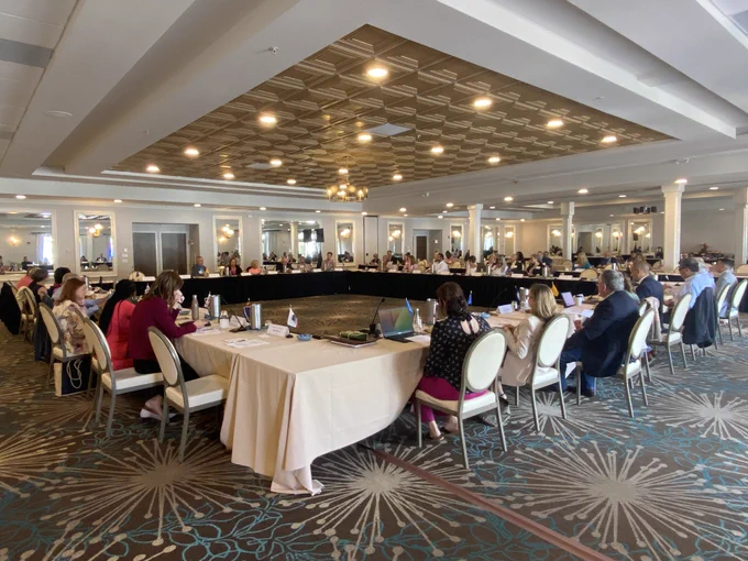 Members of the Hunt-Kean Leadership Fellows Cohort 9 sit around a hollow square table formation during a panel session.
