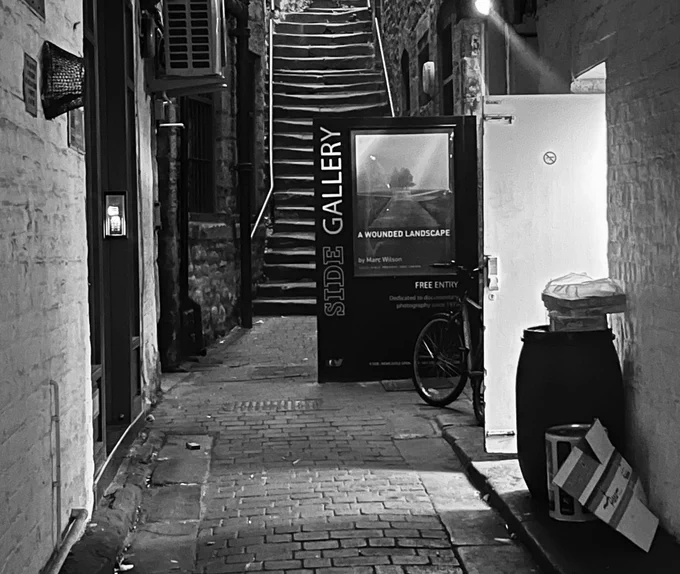 Side Gallery, Newcastle. Gallery closed at present. Exhibition picture shows ‘A Wounded Landscape’ by Marc Wilson, the last exhibition to be shown at Side Gallery.