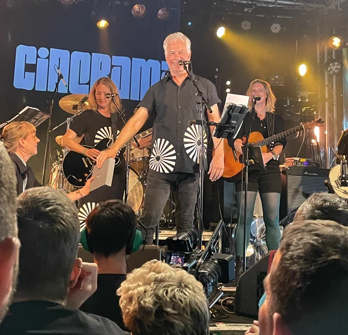 David Gedge and  Jessica holding what was to become my raffle prize! They are on stage with members of Cinerama in Brighton.