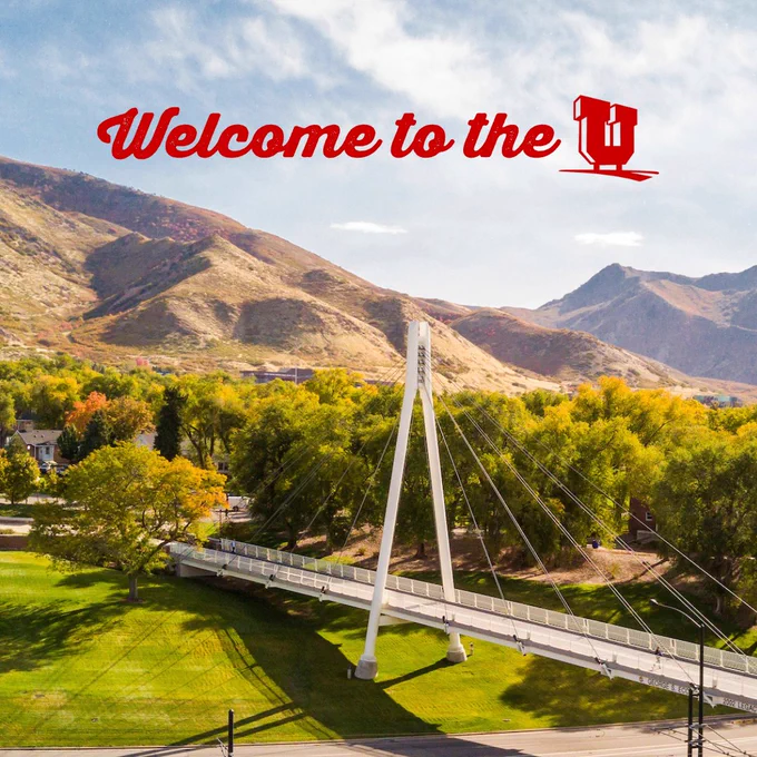 A photo of Legacy Bridge, the Fort Douglas area and the Wasatch foothills. Text at the top of the photo reads "Welcome to the U"
