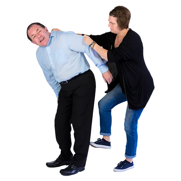 Man being held and restrained by a member of staff 