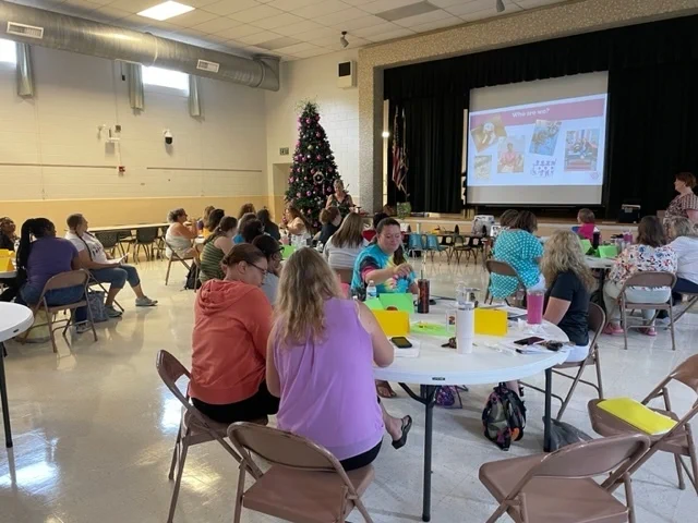 Teachers at tables